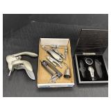 Variety of wine openers, bottle stoppers, &