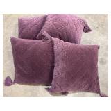 (4) purple throw pillows