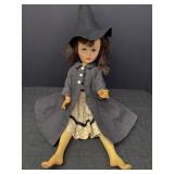Antique doll dressed as a Witch