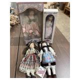 4 porcelain dolls, 2 are in original box.  16-18in