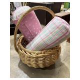 16in dia wicker basket & 2 neck rolls w/
