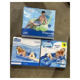 3 pool floats, boxes sealed with tape