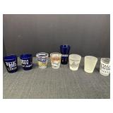Variety of souvenir shot glasses
