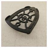 VTG Cast Iron Trivet by W. H. Howell Company