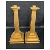Pair of gold colored column candlesticks w/