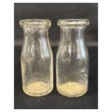 2 half pint glass milk bottles, unmarked