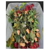 Artificial flowers, roses, greenery in plastic