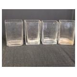 (4) clear glass vases 6in tall x 4in long x 3in