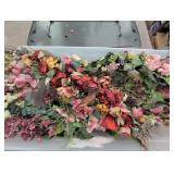 Artificial flowers & fruit swags in plastic tote