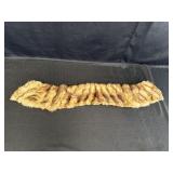 Animal pelt, irregular edges, 43 x 7in