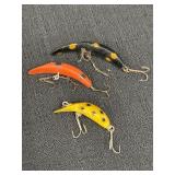 3 flatfish fishing lures, 1 is Heddon Tiny Tad.