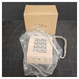 Beige-Colored Push-Button Telephone Keypad