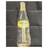 NuGrape Soda tin wall thermometer shaped like a