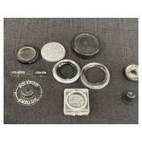 Variety of camera lenses, pieces, covers, & misc.