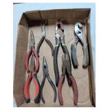 Needle nose pliers, wire cutters, pliers