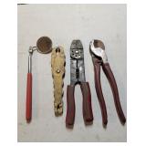 Cable cutter, wire stripper, rubber fuse puller