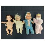 4- 10" String Pulled & Wind Up Dolls