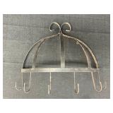 Wrought iron half-dome wall-mounted rack