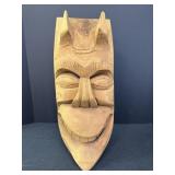 Hand-carved wooden mask, likely of Mexican,