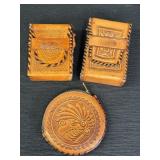 2 hand tooled leather cigarette pouches & coin