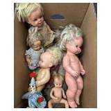 Variety of plastic dolls