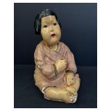 Chalkware oriental figurine, chipped in many