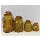 Set of 4 Moon & Stars Amber glass canisters,