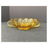 Amber glass double handled nappy bowl/candy dish