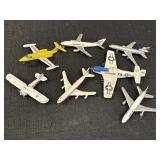 7 miniature toy airplanes, longest approx 4.5in