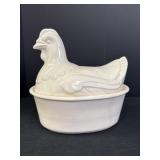 Ceramic hen on a nest oval dish, some crazing &