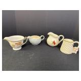 4 small pitchers, tallest is 4in H