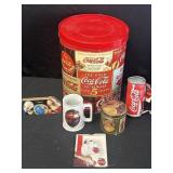 Coca-Cola tins, mug, plush toy, magnet, & sign