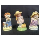 Avon porcelain figurines "Cherished moments"