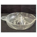 Pressed glass citrus reamer w/ ribbed design,