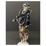 Vtg. Porcelain Harlequin musical figurine w/