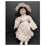 Porcelain Heritage Doll pink dress w/ lace &