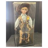 Little Companion Porcelain cowboy doll in plastic