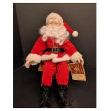 Dynasty Porcelain Santa Doll in Wood Rocking chair