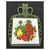 Green cast iron trivet w/fruit design ceramic