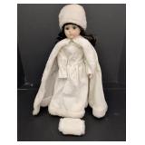 Porcelain Doll w/ white dress, cape, muff & hat
