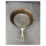 No 10 cast iron skillet.  11.5in dia. X 3.5in H