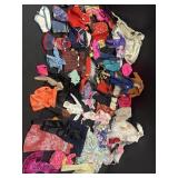 Variety of Barbie doll & other doll clothes
