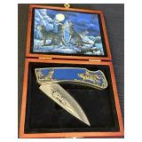 Collectible folding pocket knife, wolf design,