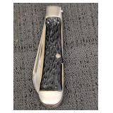 Camco USA pocket knife w/ jigged black handles
