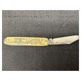 Vtg. Novelty Stegosaurus dinosaur pocket knife