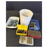 Variety of reloading casings, mostly brass