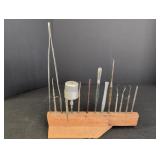 Variety of Tweezers and picks in wood stand w/
