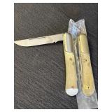 2 pocket knives, marked Italy, missing scales,