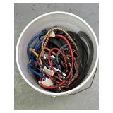 Variety of different sized bungee cords in bucket