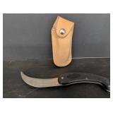 Saran serrated edge folding knife w/ black